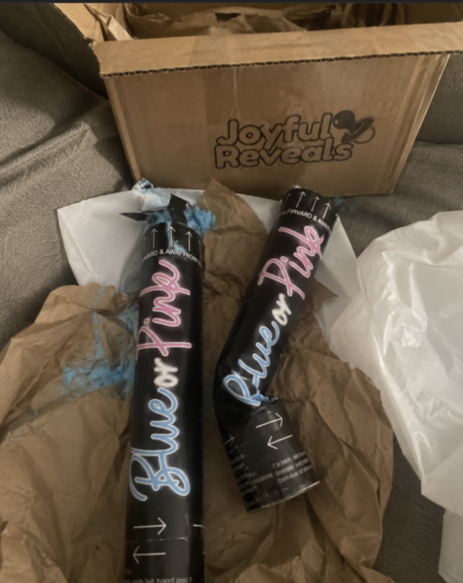 Generic cheap imported black gender reveal cannons in a shipping box — no Australian branding or compliance